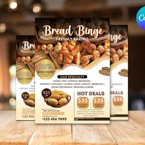 以下が含まれることがあります： 「Bread Binge」の文字と焼き菓子の写真が掲載された、ベーカリーの3つのチラシ。チラシは20％割引を宣伝し、ビーガンパイ、クッキー、砂糖不使用のパンなどの専門品をリストアップしています。チラシは木製のテーブルの上にあります。