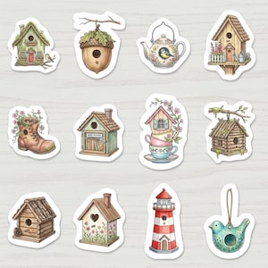 May include: A collection of whimsical stickers featuring birdhouses, a teapot with a bird, an acorn birdhouse, and a boot with flowers. The stickers are in various shapes and sizes, with a watercolor style and a light wood grain background.