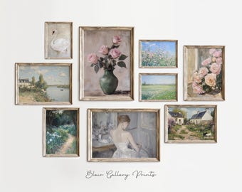 May include: A gallery wall with nine framed paintings. The paintings feature a variety of subjects, including landscapes, flowers, and a swan. The frames are all in a similar style, with a light wood finish.
