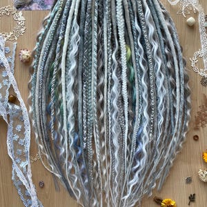 Silver Grey Ivory Blonde of mix soft dreads, braids and dread curls, and blue accents, DE dreads, Viking Witchy Style