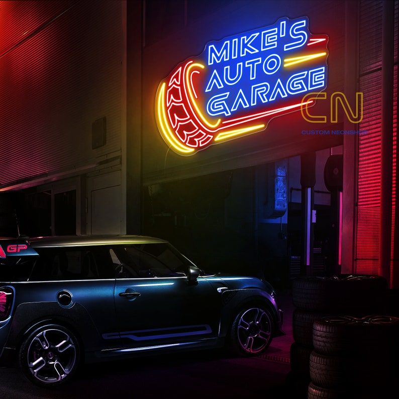May include: A blue and yellow neon sign that reads "Mike's Auto Garage" with a tire graphic. A blue Mini Cooper is parked in front of the sign.