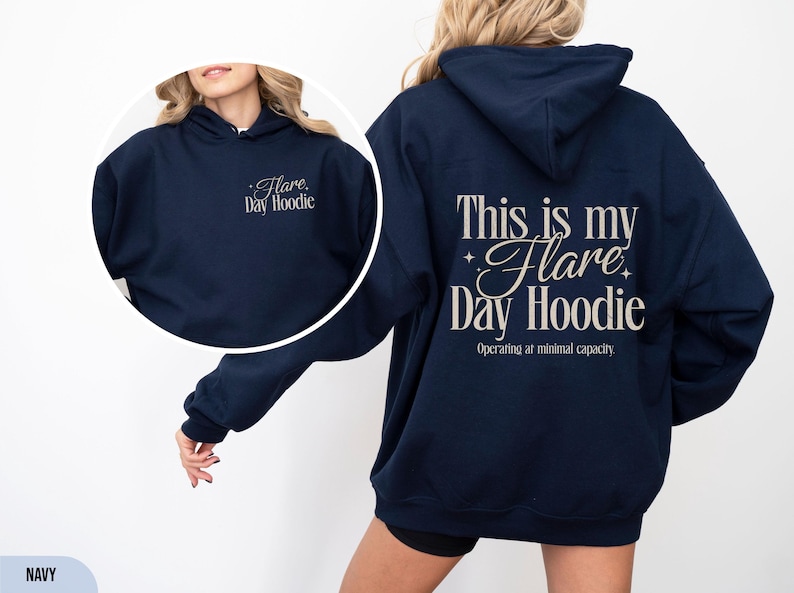 May include: Navy blue hoodie with the text "Flare Day Hoodie" on the front and "This is my Flare Day Hoodie" on the back. The back also includes the text "Operating at minimal capacity."