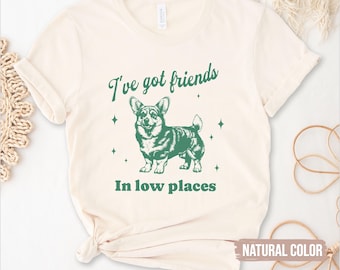 Camiseta divertida de Corgi: "Tengo amigos en lugares bajos"