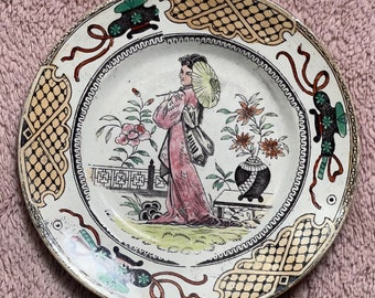 Ancienne assiette en faïence Onnaing