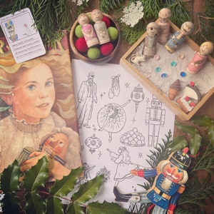 May include: A coloring page featuring a Nutcracker and a ballerina, along with other Christmas-themed illustrations. There are also wooden figurines of a Nutcracker, a ballerina, and other characters from the Nutcracker story. The text on the book reads "1934-1954 The Nutcracker Ballet".