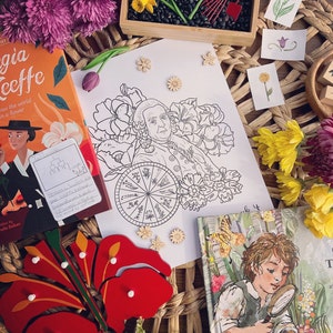 May include: A collection of educational materials for a botany or nature study unit. The materials include a book about a botanist, a coloring page of a botanist, a wooden flower puzzle, a small garden tray with black beans, a sunflower, and a rake, and a book about a boy looking at a frog with a magnifying glass.