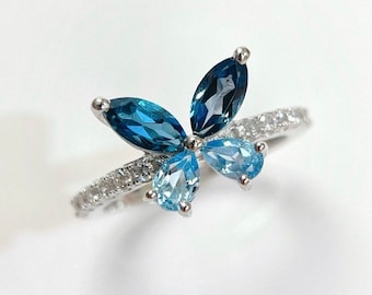 Anello a farfalla con topazio: blu Londra e blu svizzero, argento sterling