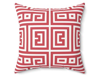 Cojín geométrico: decoración moderna en rojo y blanco