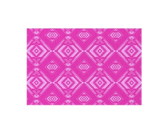 May include: A rectangular textile with a repeating geometric pattern in shades of pink. The design features diamond shapes with intricate, light pink tribal-inspired motifs. The background is a vibrant, solid pink.