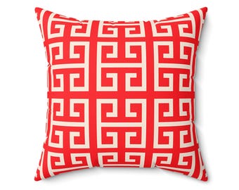 Cojín geométrico rojo: decoración moderna para el salón