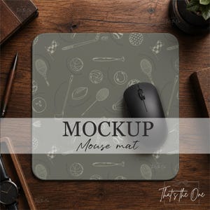 May include: A square mouse mat with a muted olive green background featuring a repeating white line-art pattern of various sports equipment including tennis rackets, golf clubs, baseball bats, and assorted balls, with a black computer mouse on top.