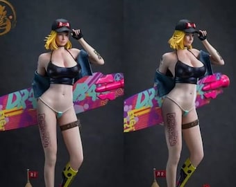 May include: A figurine of a woman with blonde hair wearing a black crop top, denim jacket, and a pink and blue bikini bottom. She is holding a pink and blue water gun and standing on a skateboard with a pink, blue, and white design. The skateboard has the text "Dragon Ball" on it.