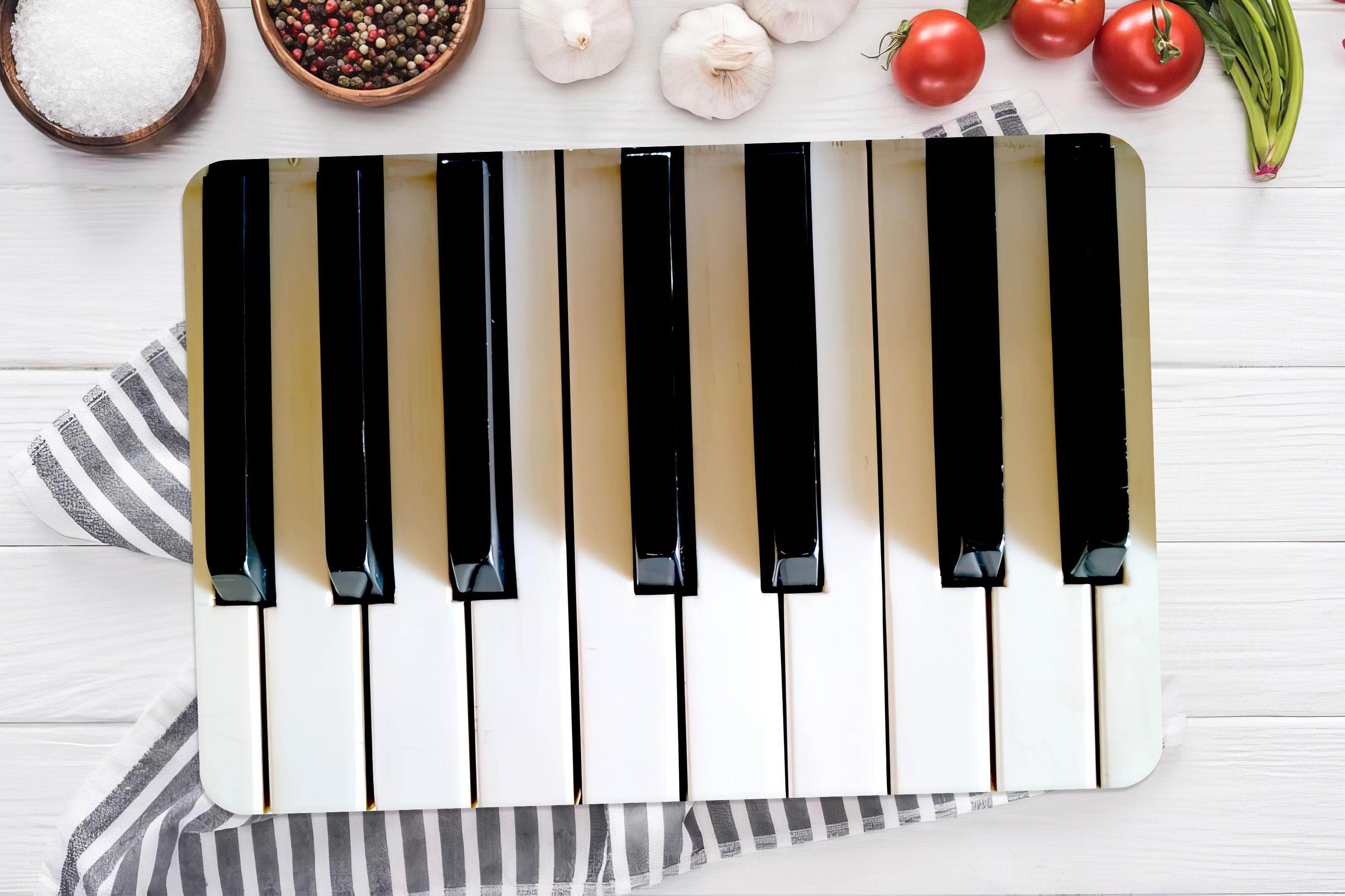 Planche à découper en verre trempé avec touches de piano : décoration de cuisine moderne