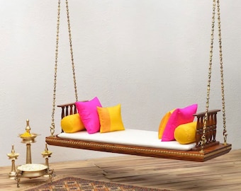 Experience Serenity: Elevate Your Home with our Luxury Wooden Indoor Swing Glide into Relaxation with our Eco-Friendly Wooden Indoor Swing.