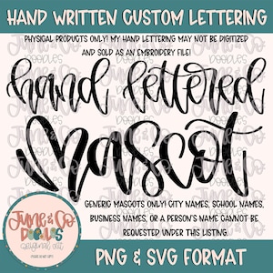 May include: A digital design featuring the words "Hand Lettered Mascot" in a bold, handwritten style. The design includes the text "Physical products only!" and "PNG & SVG Format". A circular logo with the text "June & Co Doodles" is also present.