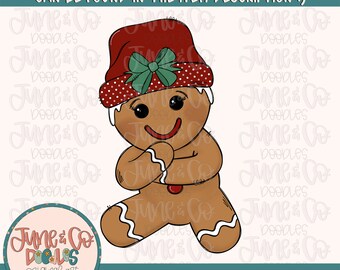May include: A gingerbread person with a red and white dotted hat, a green bow, and a brown and white gingerbread body. The gingerbread person is sitting with its arms crossed and has a happy expression on its face.
