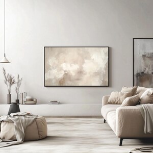 Neutral abstract Samsung Frame TV Art displayed in a modern minimalist living room with beige decor, a cozy sofa, and soft natural lighting.