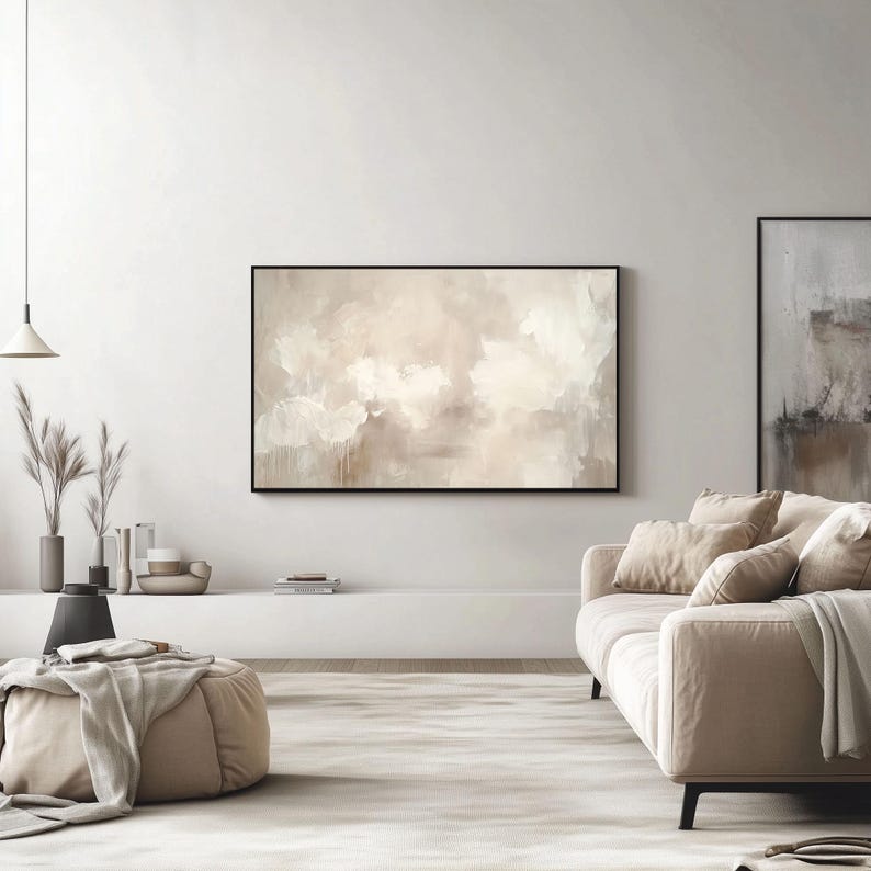 Neutral abstract Samsung Frame TV Art displayed in a modern minimalist living room with beige decor, a cozy sofa, and soft natural lighting.