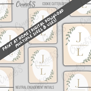 May include: A digital download featuring multiple cookie cutter designs. Each design has a beige background with an oval shape in the center, containing the initials "J" and "L". The initials are in a gold color, surrounded by a green leaf design. The text "Print at Home | Digital Download Multiple Sizes & Uses!" is also visible.