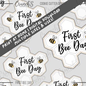 May include: Honeycomb-shaped cookie cutter design with the text "First Bee Day" in black script. Each honeycomb has a small cartoon bee. The image also includes the text "Print at Home | Digital Download Multiple Sizes & Uses!"