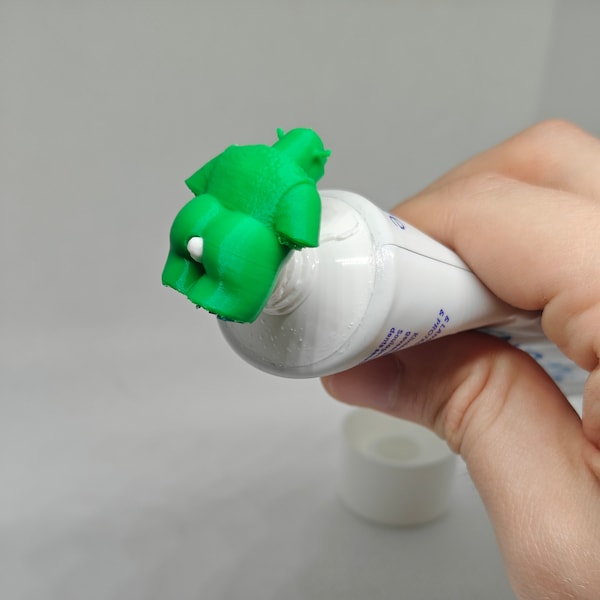 Shrek toothpaste pooper topper attachment piece for all your toothpaste tubes