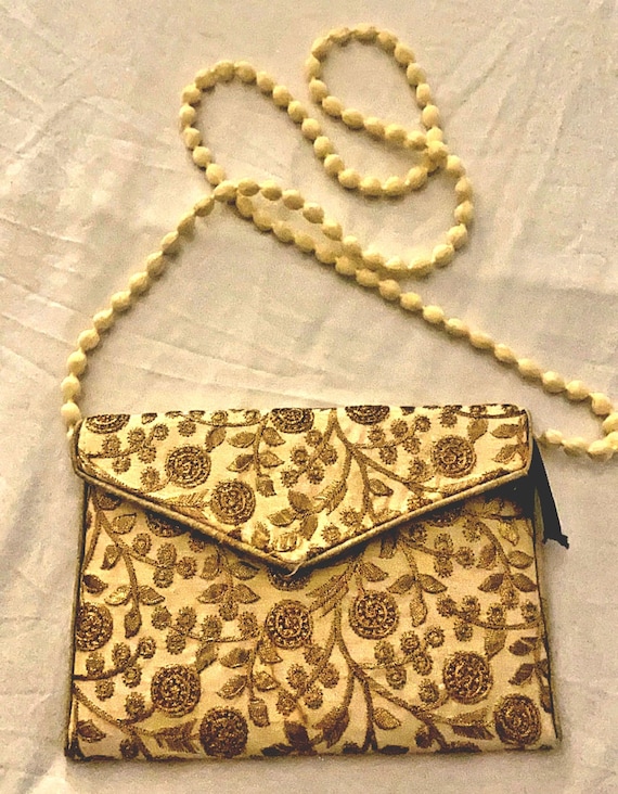 Borsa pochette a busta ricamata a mano oro indiana Italia