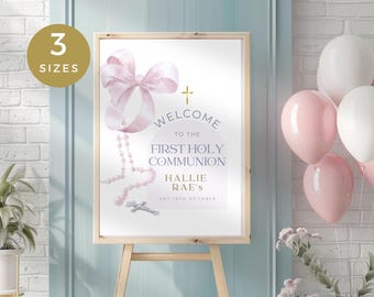 May include: A printable sign for a First Holy Communion celebration. The sign features a pink bow, a gold cross, and a rosary. The text on the sign reads "Welcome to the First Holy Communion Hallie Rae's Oct 15th, October".