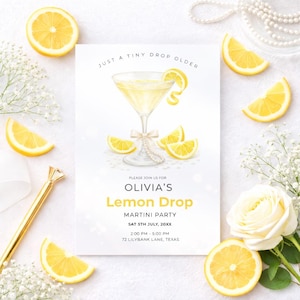 May include: A white invitation card with the text "JUST A TINY DROP OLDER" and "OLIVIA'S Lemon Drop MARTINI PARTY". The card is decorated with a martini glass, lemon slices, and pearls. Fresh lemon slices and flowers surround the card.