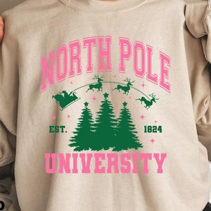 North Pole University Sweatshirt Christmas Sweater Cute Holiday Hoodie Santa Workshop Shirt Funny Xmas Crewneck Northpole Gift Christmas Tee