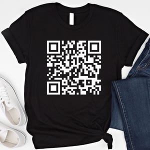 May include: Black t-shirt with a white QR code design.