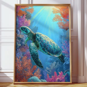 May include: A framed art print depicting a sea turtle in a colourful coral reef. The image shows a teal turtle set against blue water, coral, and sunlight. The frame is a warm, natural wood colour.