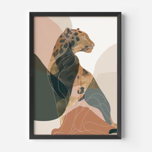 May include: A framed art print featuring a stylized leopard in shades of brown, green, and tan. The artwork has an abstract design with a minimalist aesthetic. The leopard is depicted in a seated pose, with a white outline.