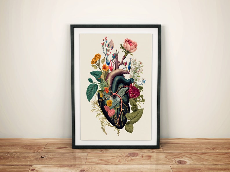 May include: A black anatomical heart with a variety of colorful flowers growing from it. The heart is surrounded by green leaves and vines. The background is a cream color.