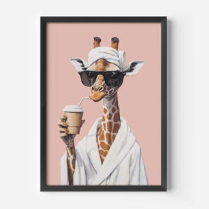 May include: A giraffe wearing sunglasses and a white bathrobe holds a cup of coffee with a straw. The giraffe is against a light pink background.