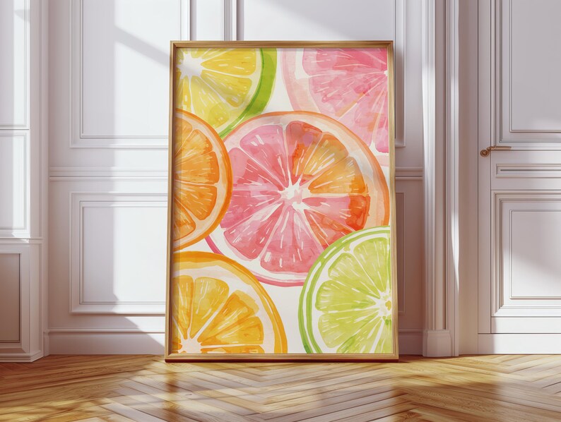 May include: A framed watercolor print featuring vibrant citrus fruit slices. The artwork showcases oranges, grapefruits, lemons, and limes in shades of orange, pink, yellow, and green. The wooden frame complements the colorful fruit art.