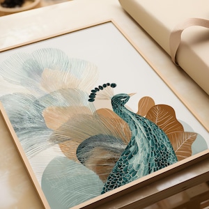 May include: Framed art print featuring a peacock illustration. The artwork showcases a teal peacock with a detailed feather pattern, set against a backdrop of abstract shapes in shades of brown, teal, and beige. The frame is a light wood color.