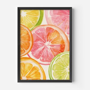 May include: A framed art print featuring a watercolor illustration of citrus fruit slices. The artwork showcases vibrant oranges, pink grapefruits, yellow lemons, and green limes. The fruit slices are arranged in a close-up composition, with a black frame.