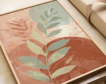 May include: A framed botanical art print featuring a stylized leaf design. The artwork showcases a color palette of muted greens, rust, and peach tones, with white line details. The print is set in a light wood frame, creating a modern aesthetic.