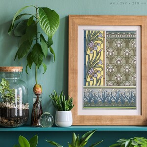 May include: A framed print of a vintage botanical illustration featuring a repeating pattern of stylized iris flowers in shades of blue, green, and yellow. The print is displayed on a shelf with various potted plants.