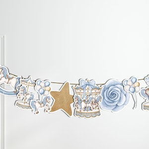 May include: A blue and gold garland with a carousel horse, rocking horse, star, rose, and balloons. The garland is perfect for a baby shower or birthday party.