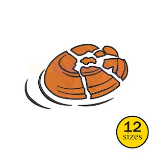 May include: An orange clay target, broken into pieces, with black curved lines indicating motion. The design includes a yellow circle with the text "12 sizes".