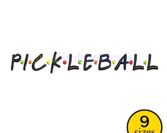 May include: Black embroidered text "PICKLEBALL" with colorful dots in place of the letters' centers. A yellow circle with the text "9 sizes" is in the bottom right corner. The design is on a white background.