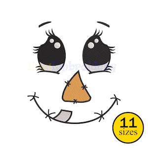 May include: A smiling scarecrow face design with black eyes, eyelashes, and a stitched orange nose. The mouth is a stitched curve with a single tooth. A yellow circle with the text "11 sizes" is in the lower right corner.