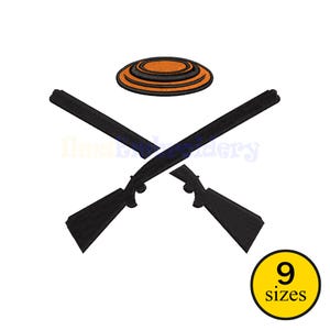 May include: An embroidered design featuring two crossed black shotguns beneath an orange and black clay target. A yellow circle with the text "9 sizes" is in the lower right corner. The design is for embroidery.
