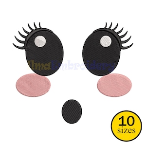 May include: An embroidered design of a cartoon face with large black eyes, eyelashes, and pink cheeks. A small black nose is centered below the eyes. The design includes the text "10 sizes" in a yellow circle.