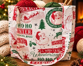 May include: A white fabric tote bag featuring a festive Christmas print with red and green stamps, Santa Claus illustrations, pine trees, and text including Ho Ho Winter Wonderland, North Pole Express, and Special Delivery.