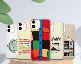 May include: Four different phone cases with various designs. The first case features a house with a heart and the text "Harry's House". The second case has a colourful patchwork design with the text "It's Cause I Love You Because". The third case has a colourful patchwork design with the text "Satellite" and "Harry Styles". The fourth case has a collage of images with the text "As It Was" and "Harry's House".