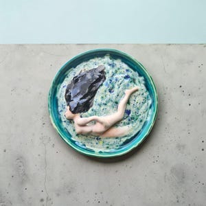 Handmade Ceramic Art Plate – Sculpted Diving Figure, Obsidian Stone, Teal Pottery