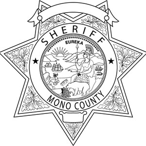 May include: Black and white illustration of a sheriff's badge with a six-pointed star shape. The badge features the words "SHERIFF" and "MONO COUNTY" around a central circle with the words "EUREKA" and a depiction of a woman holding a spear.