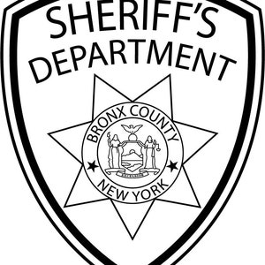 May include: Black and white illustration of a sheriff's badge with the text "SHERIFF'S DEPARTMENT" at the top and "BRONX COUNTY NEW YORK" inside a star.